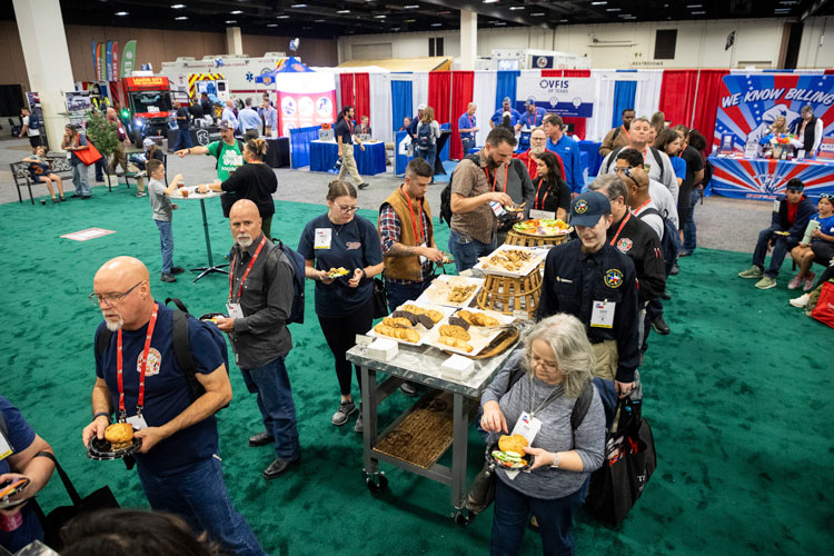 2024TexasEMSConf-349-attendee-750x500 attendees enjoying food and networking at Welcome Reception | Texas EMS Conference