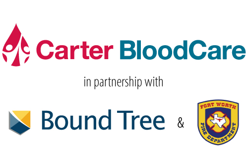 Exhibitors interacting with attendees in front of ambulance at Texas EMS Conference